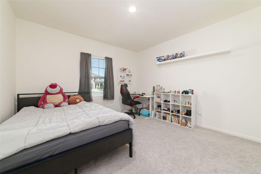Furnished interior view inside a new home in Sunterra, Katy (Image 11).