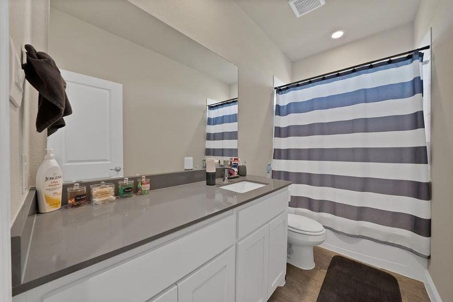 Furnished interior view inside a new home in Pecan Square, Northlake (Image 26).