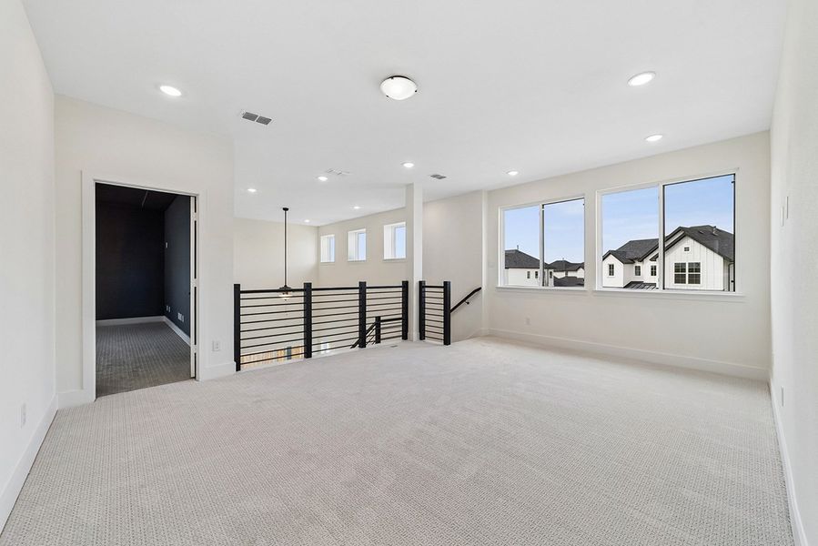 Representative unfurnished interior of a home built from the Leona by Landon Homes in Fields - East Village, Frisco (Image 36). Representative unfurnished interior of a home built from the Leona by Landon Homes in Fields - East Village, Frisco (Image 36).