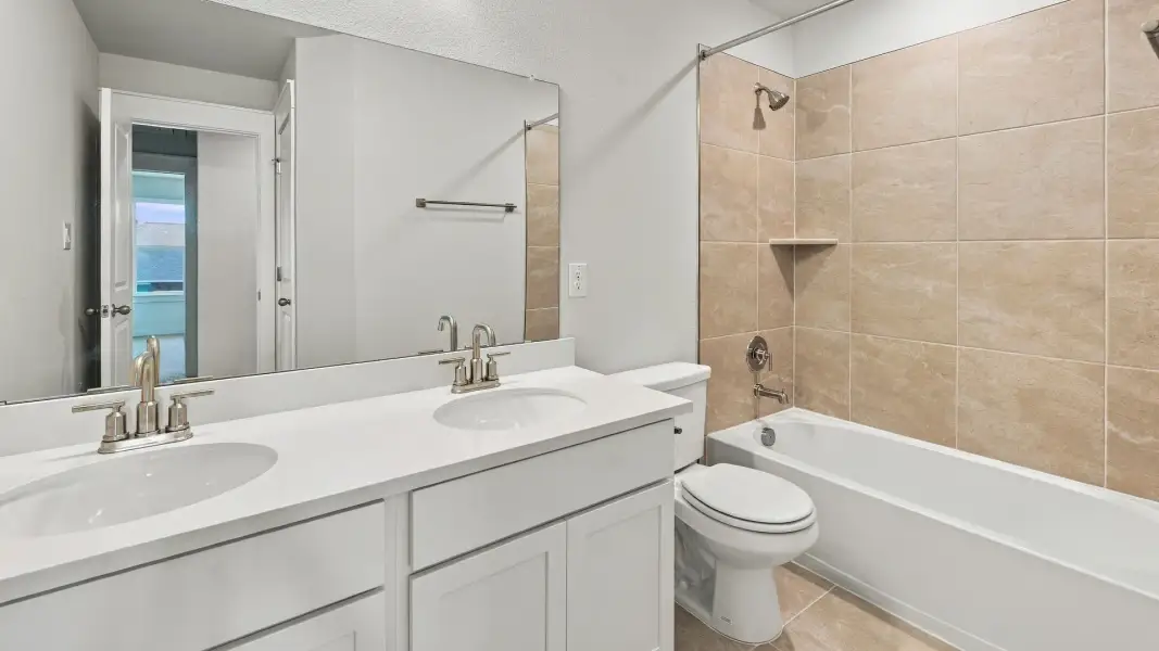 Furnished interior view inside a new home in Carillon, Manor (Image 10).