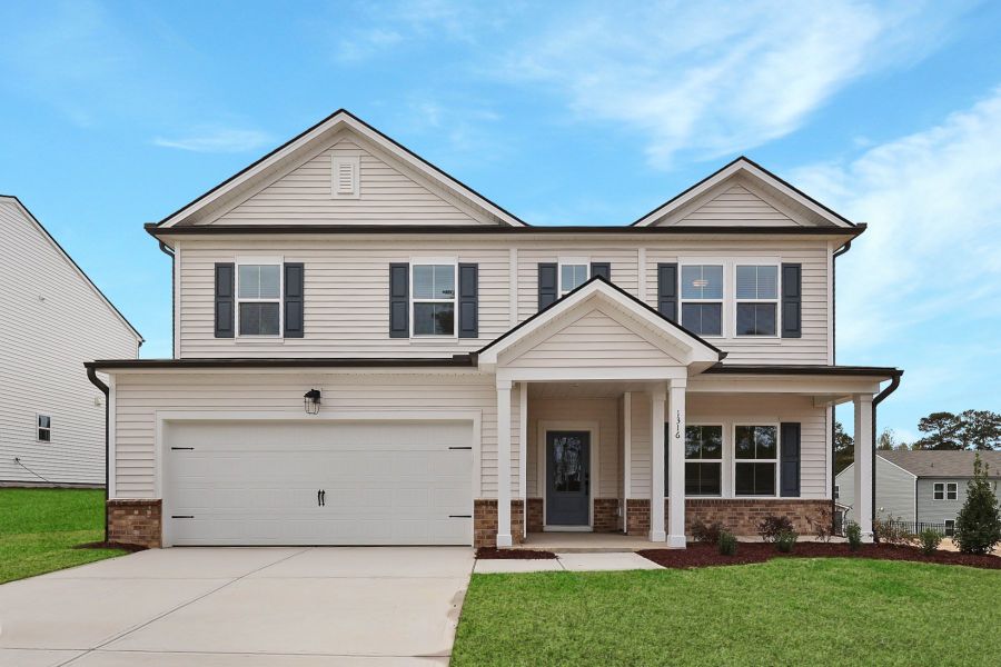 Front exterior of a new home in Watkins Grove, Raleigh, NC, highlighting curb appeal (Image 1). Front exterior of a new home in Watkins Grove, Raleigh, NC, highlighting curb appeal (Image 1).