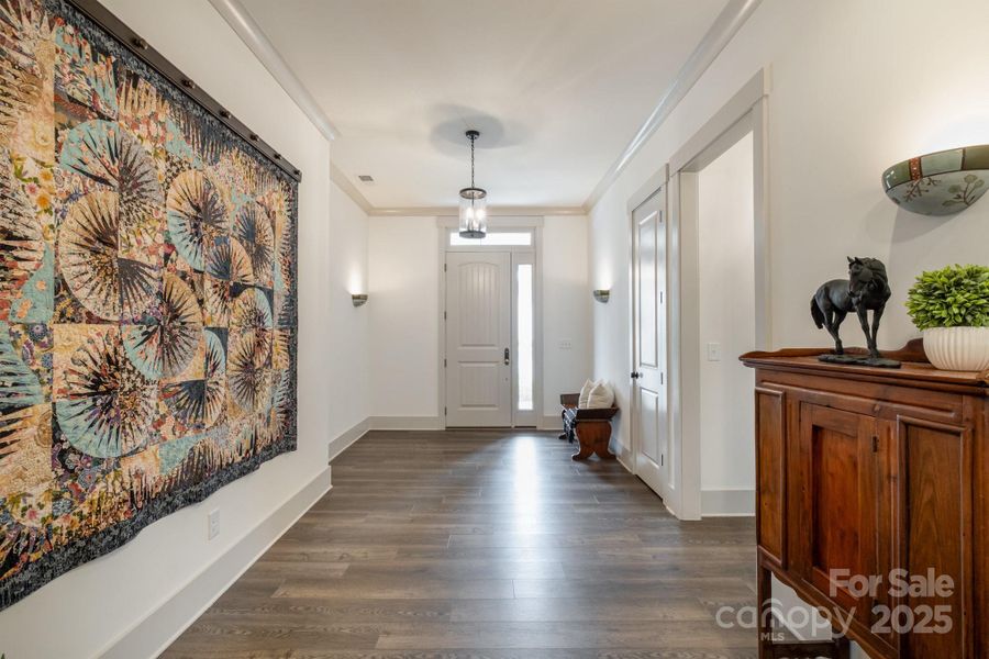 Lovely wide foyer entrance which is the perfect space to welcome guests and display art, quilts or even favorite furniture pieces Lovely wide foyer entrance which is the perfect space to welcome guests and display art, quilts or even favorite furniture pieces