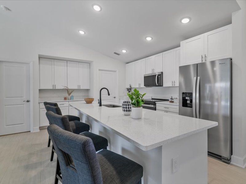Representative furnished interior of a home built from the The Paradise Cove II by Sunlife Homes LLC in Cape Coral, Cape Coral (Image 6).