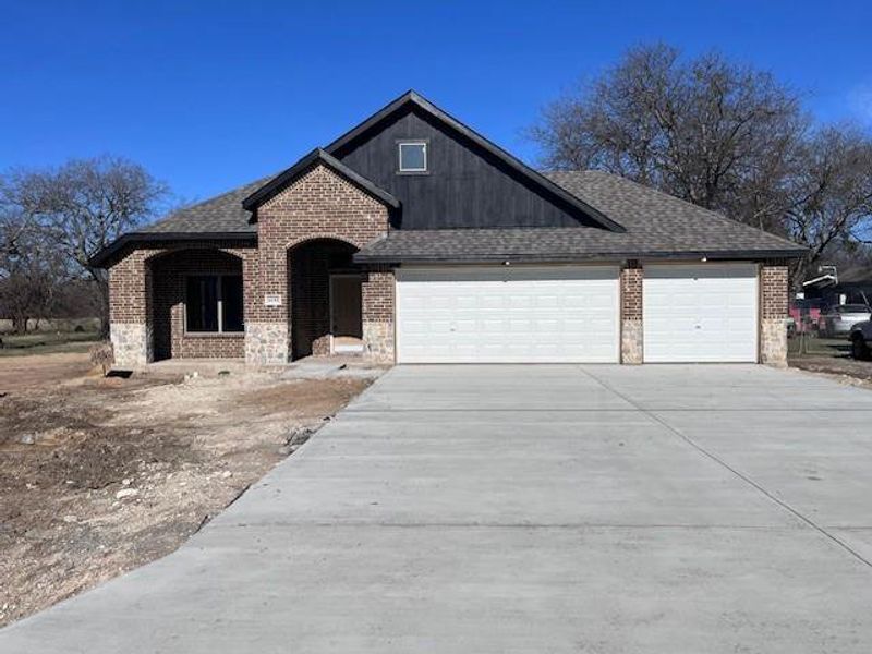 View of front of home with a garage