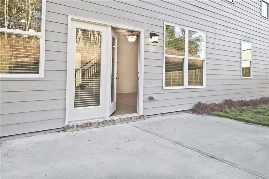 Exterior details and patio area of a home in Highland Park, Stonecrest (Image 1).