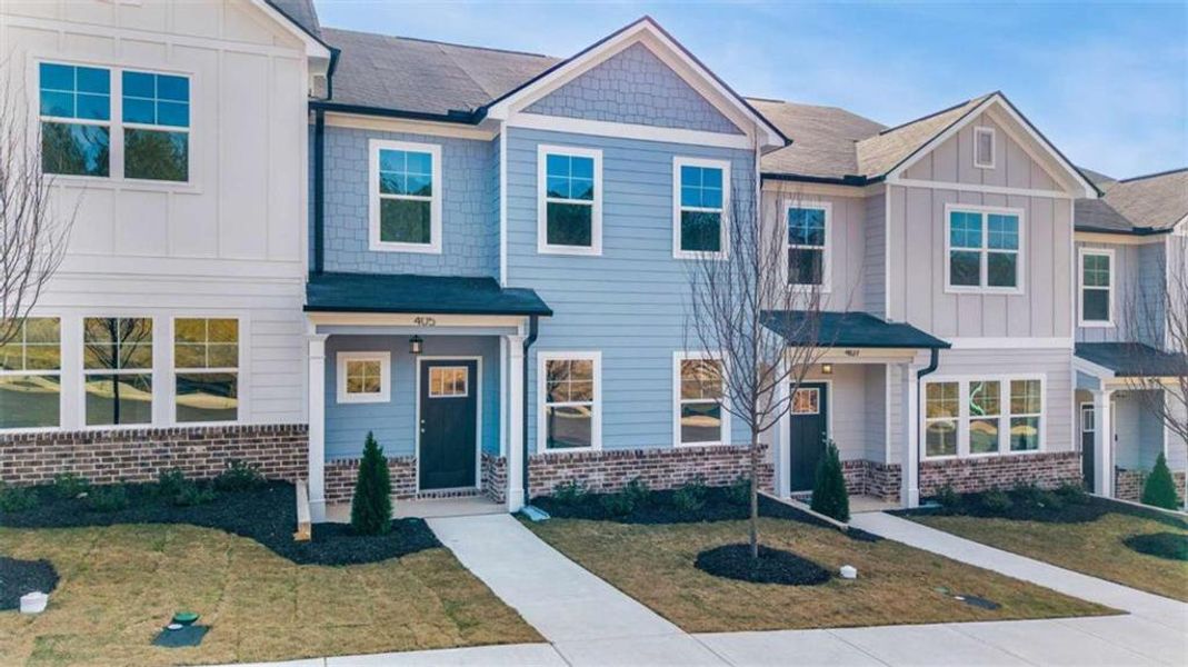 Front exterior of a new home in , Conyers, GA, highlighting curb appeal (Image 15). Front exterior of a new home in , Conyers, GA, highlighting curb appeal (Image 15).