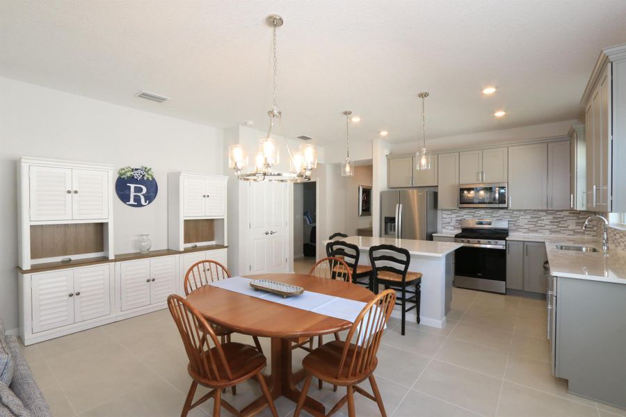 Furnished interior view inside a new home in Del Webb Tradition, Port St. Lucie (Image 17).
