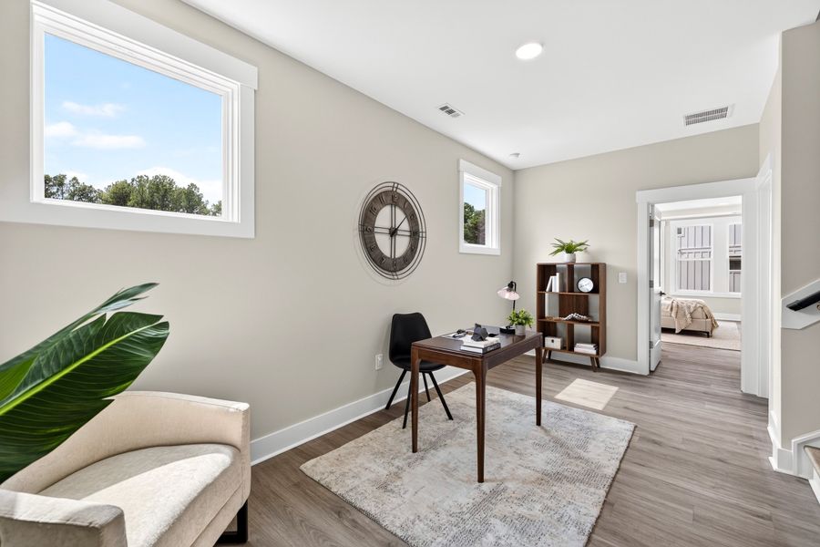 Representative furnished interior of a home built from the Weston End Unit by Baker Residential in Parc at Bradley Farm, Apex (Image 30).