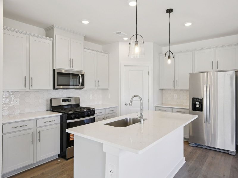 Prep dinner in the kitchen without missing the conversation in the great room.