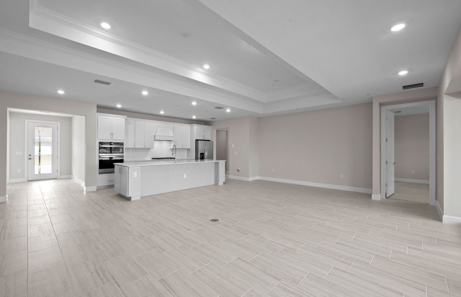 Spacious, unfurnished interior of a new home in Del Webb Oak Creek, North Fort Myers (Image 26).