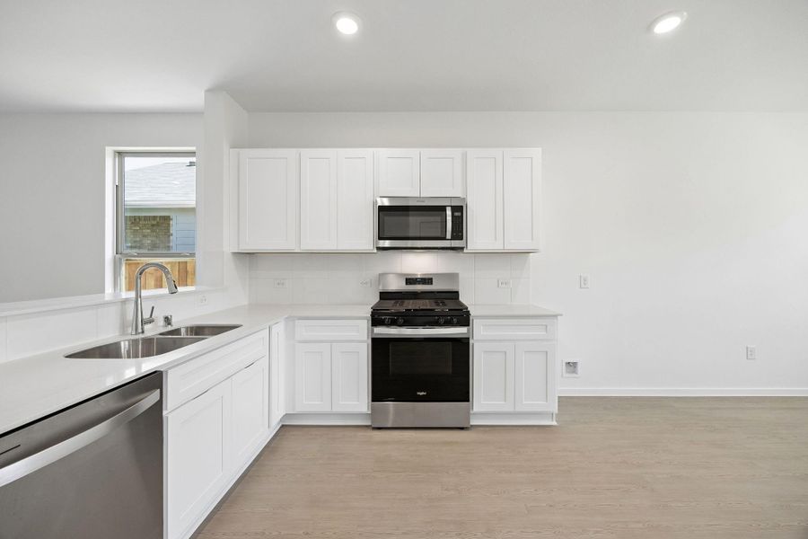 Furnished interior view inside a new home in Mavera, Conroe (Image 9).