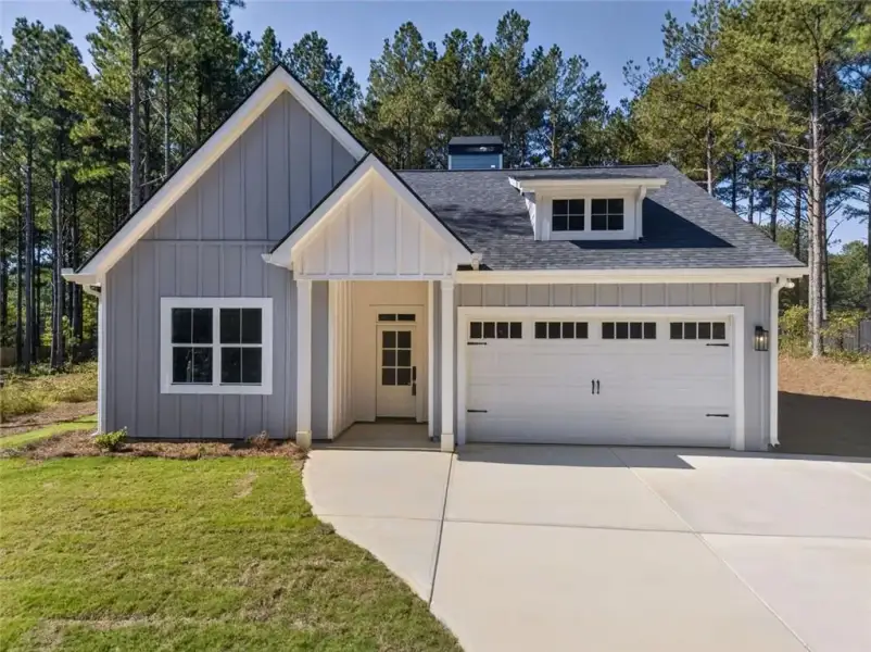 Front exterior of a new home in , Dallas, GA, highlighting curb appeal (Image 23). Front exterior of a new home in , Dallas, GA, highlighting curb appeal (Image 23).