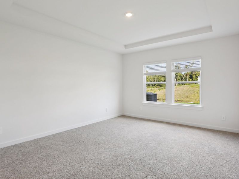 The primary suite offers a private retreat.