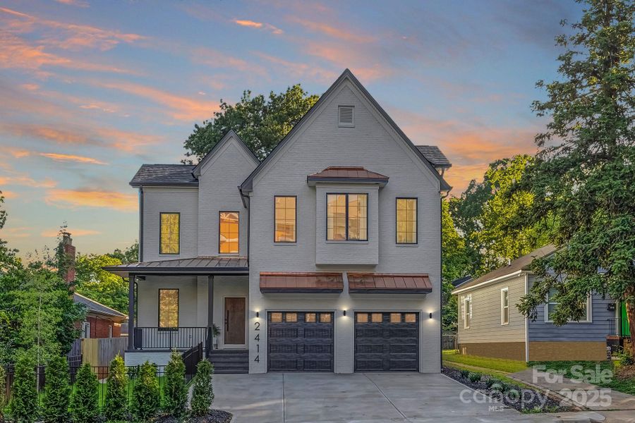 Front exterior of a new home in , Charlotte, NC, highlighting curb appeal (Image 1).