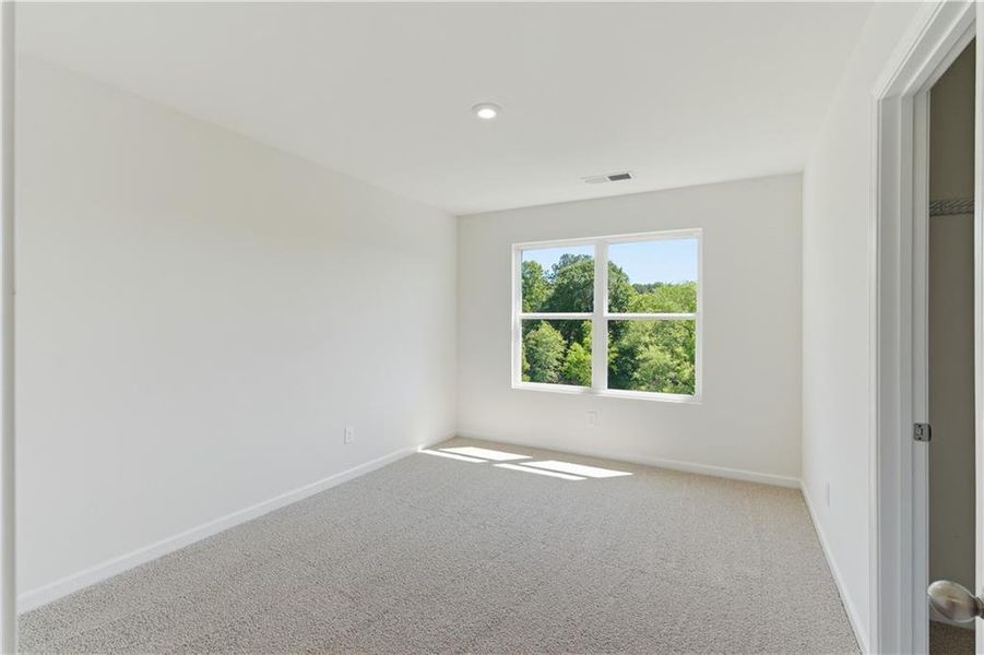 Spacious, unfurnished interior of a new home in The View at Groover’s Lake, Lithia Springs (Image 12).