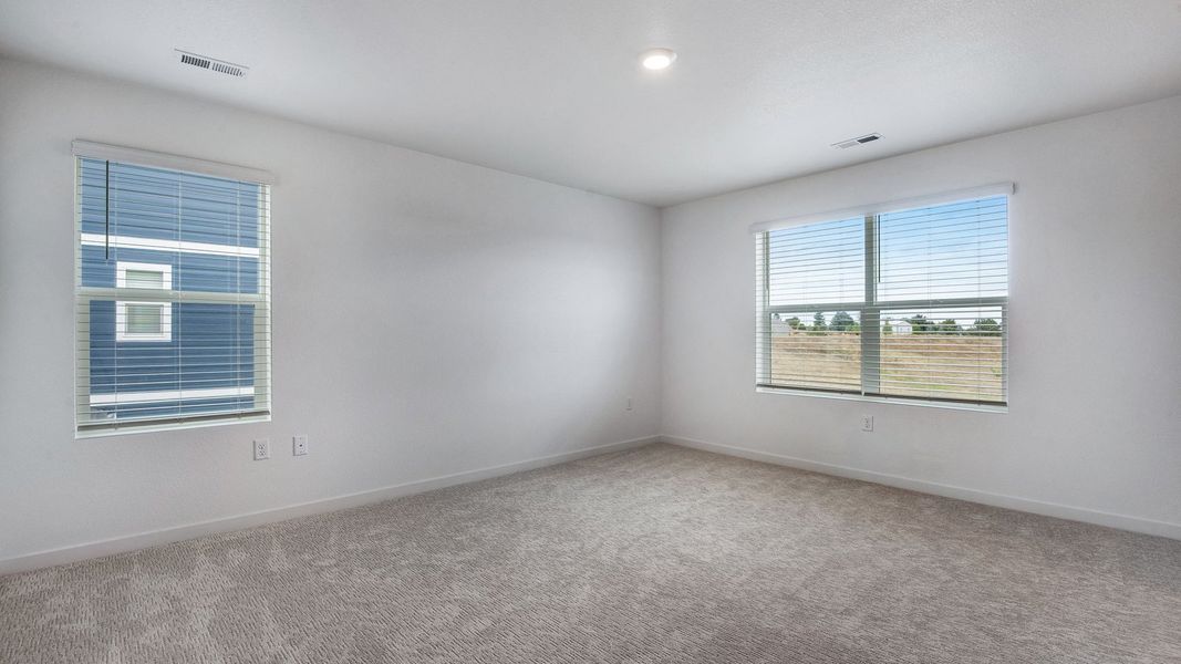 Spacious, unfurnished interior of a new home in Trails at Crowfoot, Parker (Image 21).