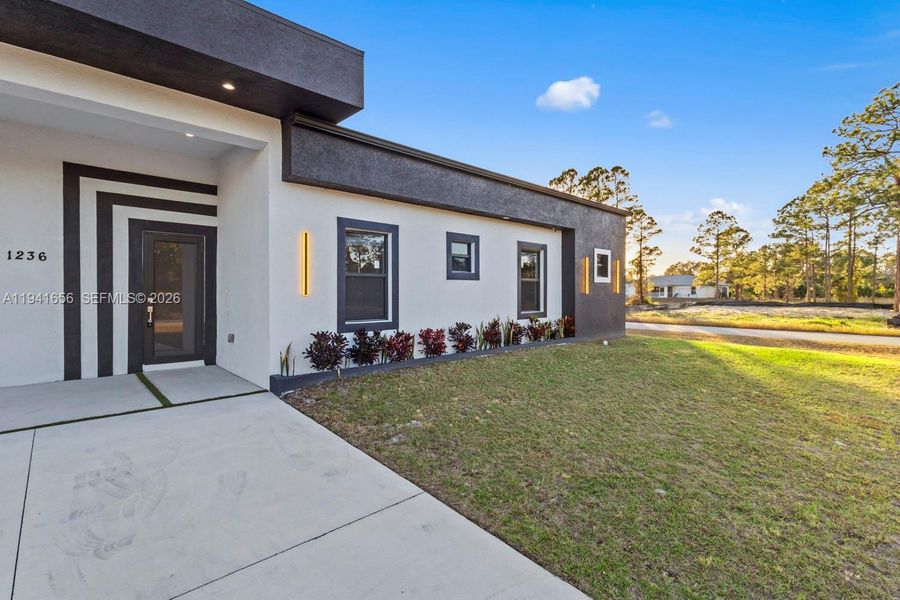 Exterior details and patio area of a home in , Lehigh Acres (Image 26).