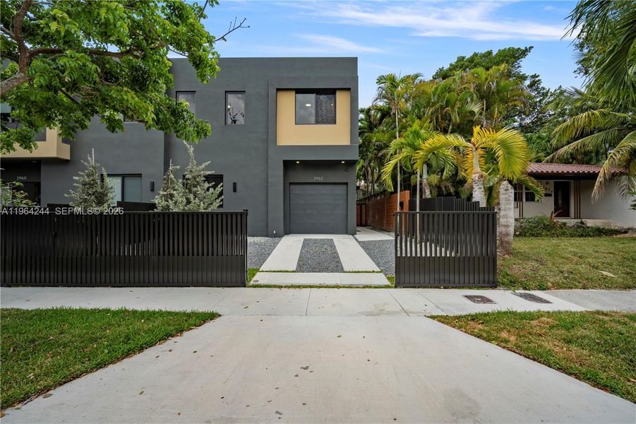 Front exterior of a new home in , Miami, FL, highlighting curb appeal (Image 2). Front exterior of a new home in , Miami, FL, highlighting curb appeal (Image 2).
