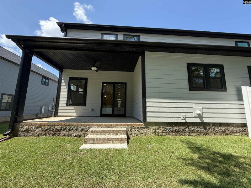 Front exterior of a new home in Dunbar Village, Cayce, SC, highlighting curb appeal (Image 26). Front exterior of a new home in Dunbar Village, Cayce, SC, highlighting curb appeal (Image 26).
