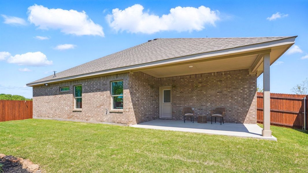 Representative exterior photo of a completed home built from the Garden Valley by D.R. Horton in Retta Estates, Mansfield, TX (Image 22).