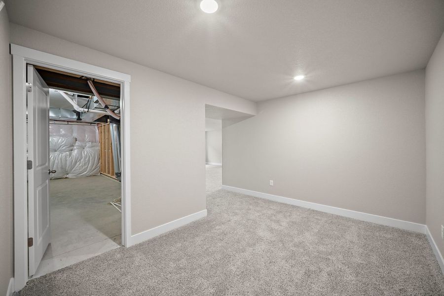 Spacious, unfurnished interior of a new home in Ridge at Lorson Ranch, Colorado Springs (Image 31).
