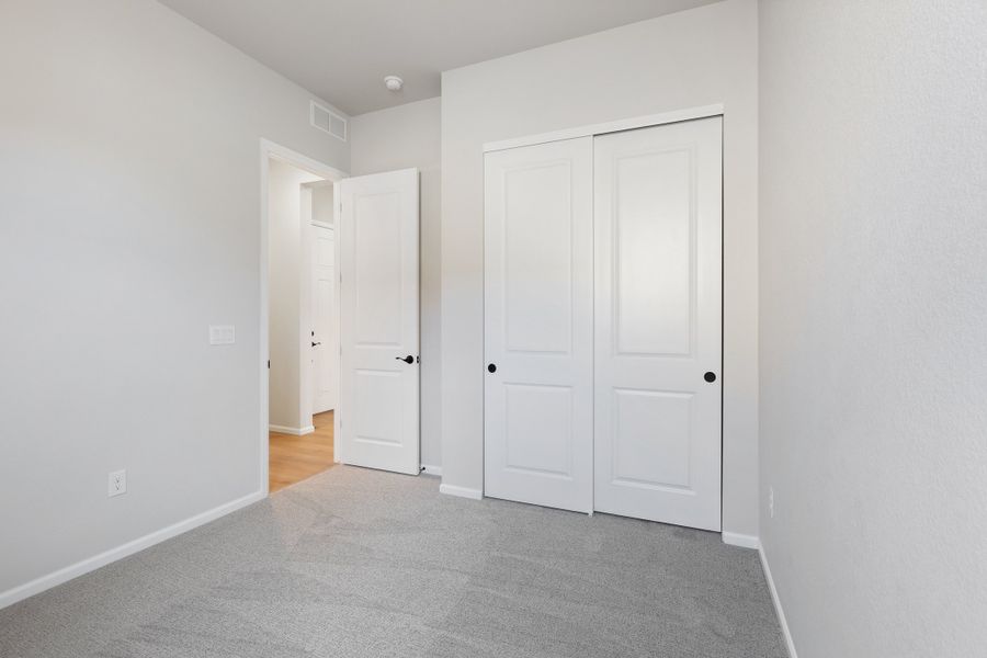 Spacious, unfurnished interior of a new home in The Manors Collection at Golden Overlook, Golden (Image 17).