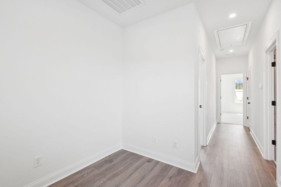 Spacious, unfurnished interior of a new home in The Domus Collection at Midtown Nexton, Summerville (Image 29).