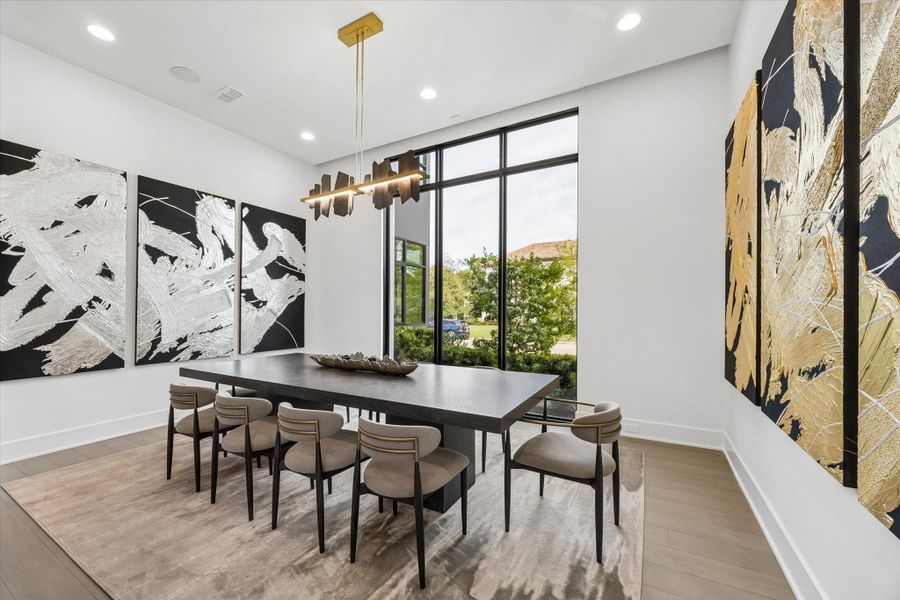 The dining room is ample with lots of natural light and beautiful views. The dining room is ample with lots of natural light and beautiful views.