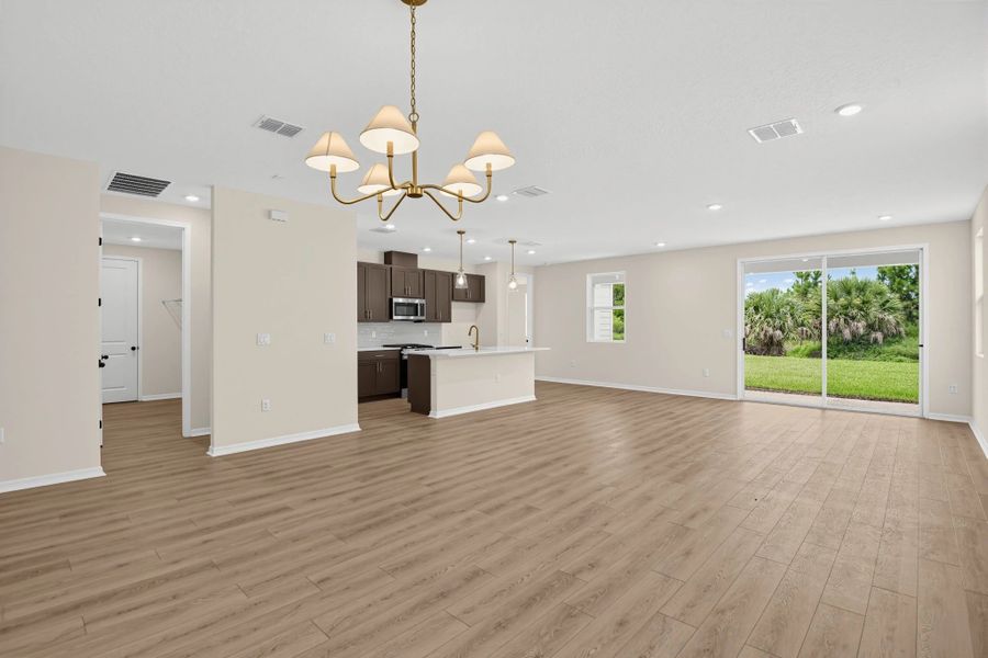 Spacious, unfurnished interior of a new home in Ardisia Park, New Smyrna Beach (Image 18).