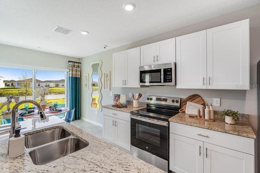 Furnished interior view inside a new home in Firethorn, Parrish (Image 13).