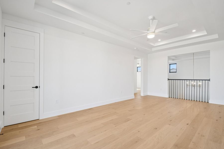 Spacious, unfurnished interior of a new home in Milky Way at River Place, Austin (Image 18).
