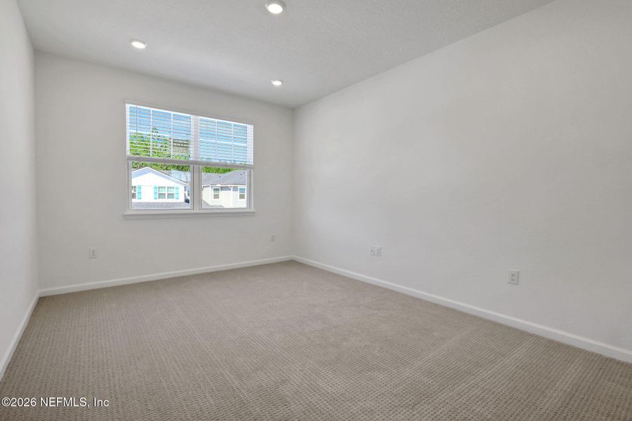 Spacious, unfurnished interior of a new home in Brook Forest, St. Augustine (Image 16).