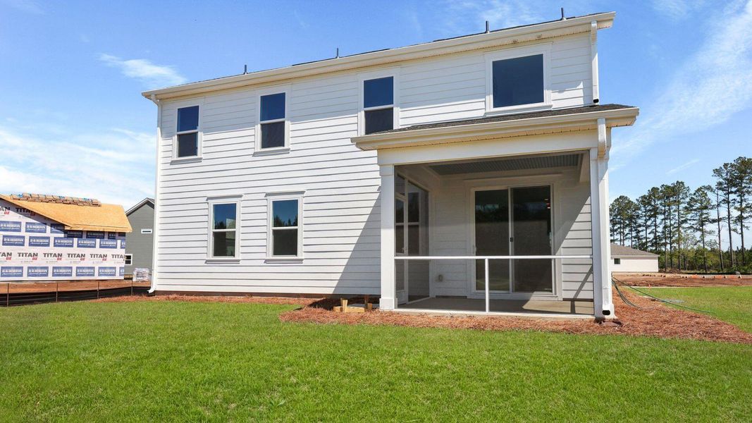 Exterior details and patio area of a home in Berkeley Bay, Ridgeville (Image 24).