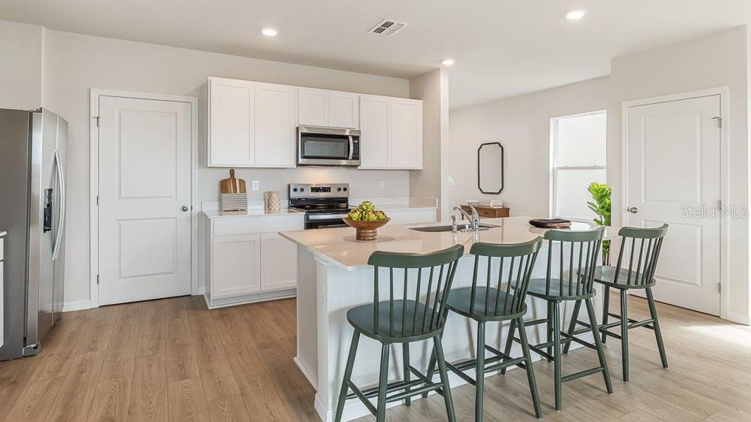 Furnished interior view inside a new home in Bella Lago, Parrish (Image 5).