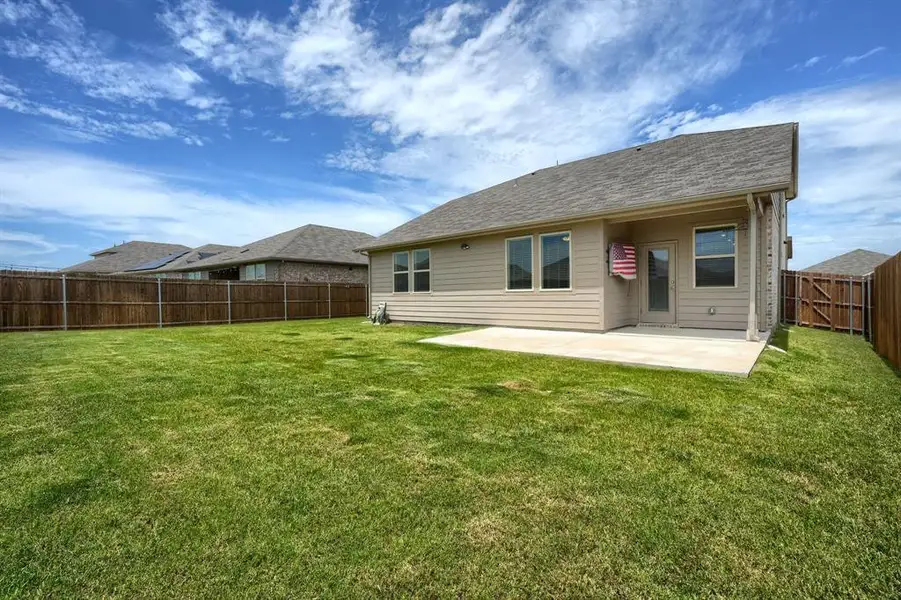Exterior details and patio area of a home in , Crandall (Image 4).