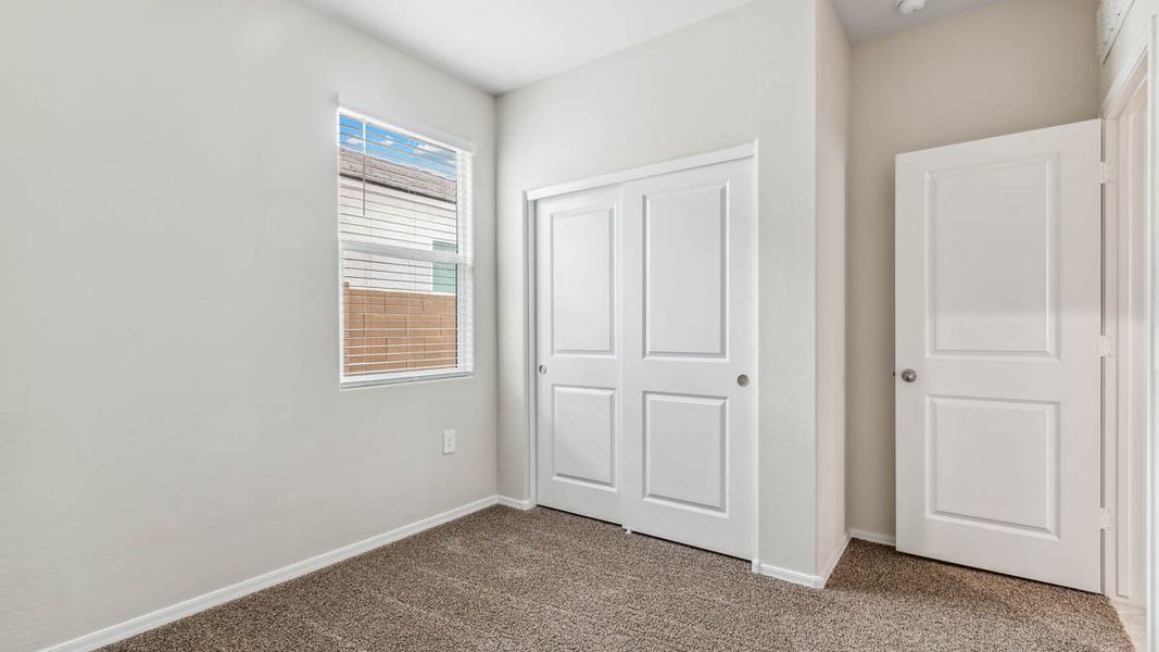 Spacious, unfurnished interior of a new home in Heartland Ranch, Coolidge (Image 20).