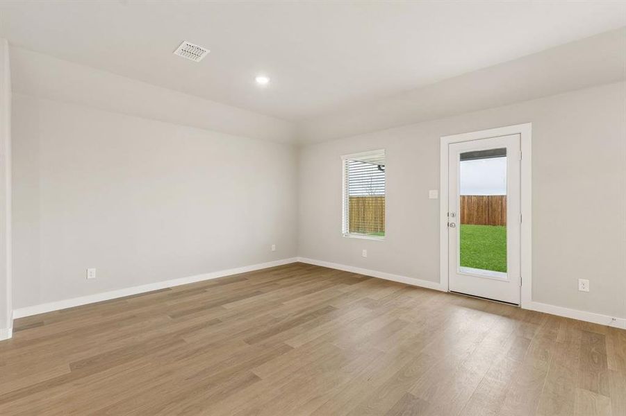 Living Room in the Emmy II home plan by Trophy Signature Homes - REPRESENTATIVE PHOTO