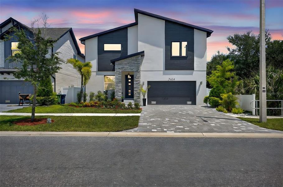 Front exterior of a new home in , Tampa, FL, highlighting curb appeal (Image 29).