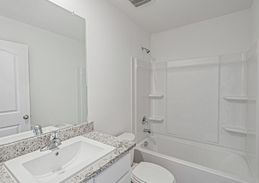 Bathroom with a shower/tub combination