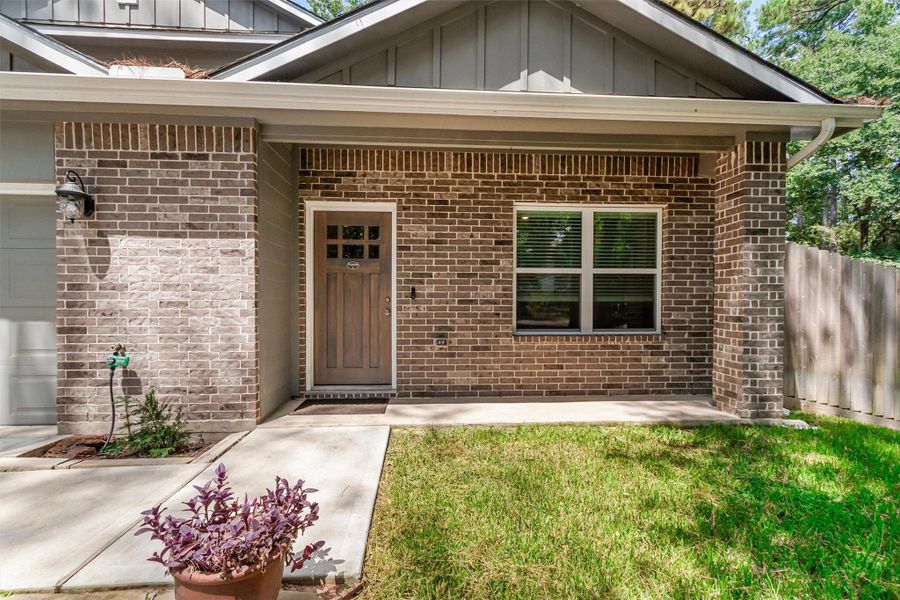 Exterior details and patio area of a home in , Conroe (Image 3).