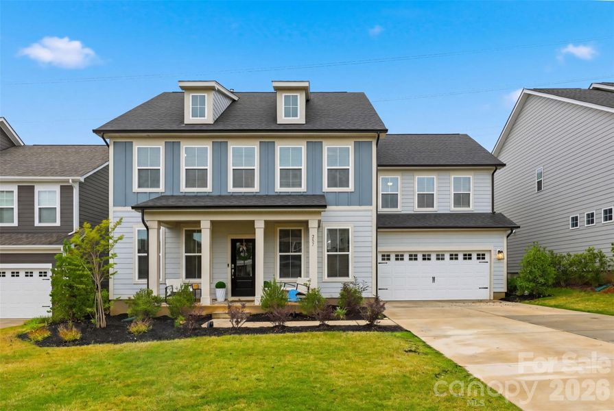 Front exterior of a new home in Lakeside Glen, York, SC, highlighting curb appeal (Image 2). Front exterior of a new home in Lakeside Glen, York, SC, highlighting curb appeal (Image 2).