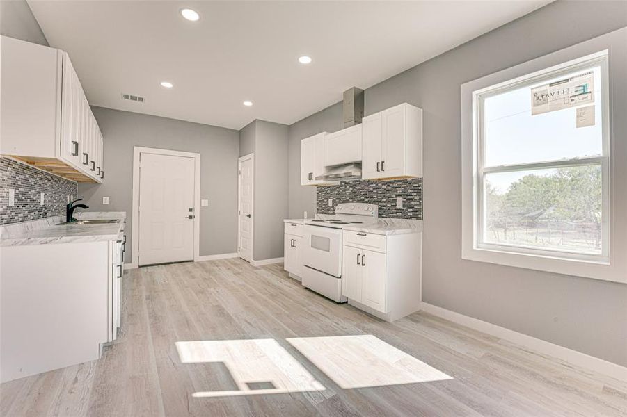 Furnished interior view inside a new home in , Rice (Image 5).