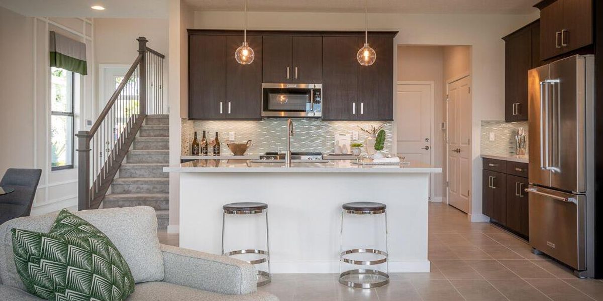 Furnished interior view inside a new home in Tradition - Cadence - Townhomes, Port St. Lucie (Image 8).