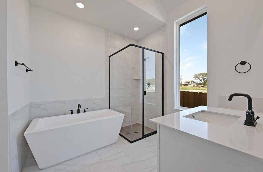 Furnished interior view inside a new home in Meridiana, Manvel (Image 9).