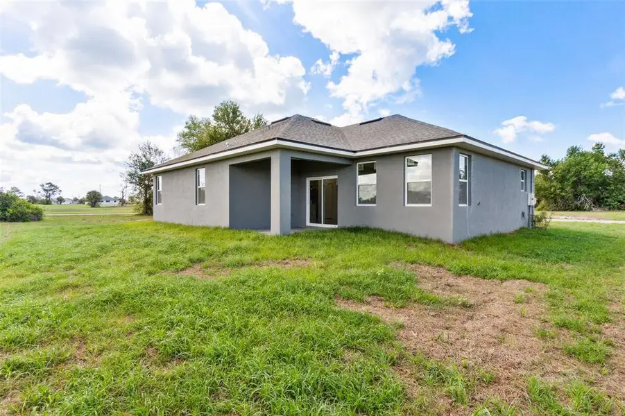 Exterior details and patio area of a home in , Placida (Image 4).