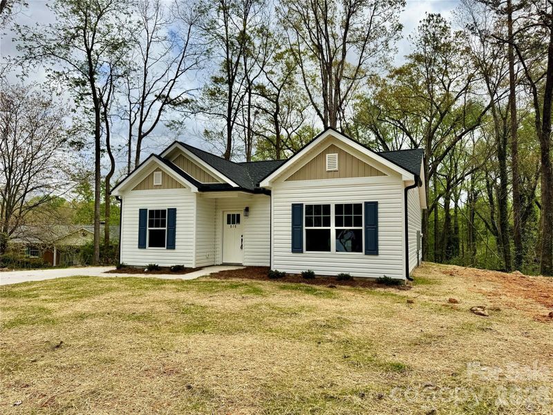 Front exterior of a new home in , Granite Quarry, NC, highlighting curb appeal (Image 15).