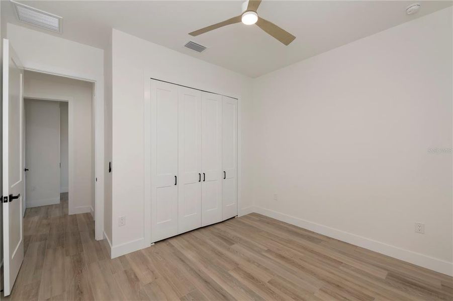 Spacious, unfurnished interior of a new home in , Port Charlotte (Image 21).