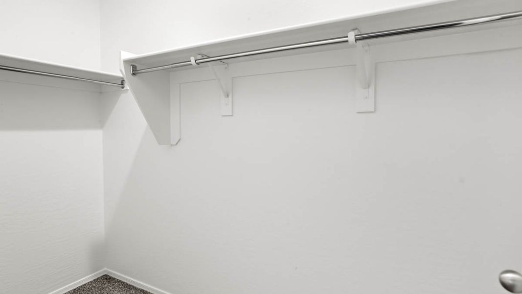 Representative unfurnished interior of a home built from the McCormick by D.R. Horton in Rio Rancho Estates, Surprise (Image 27).