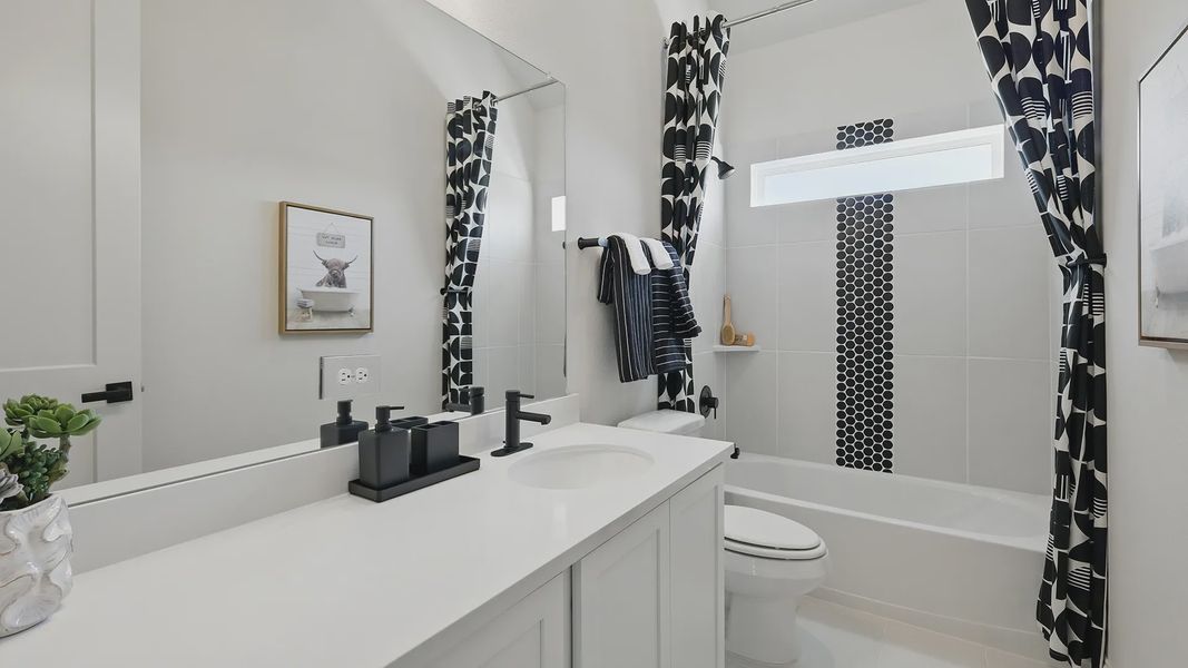 Model home photos of similar floorplans, not pictures of actual home.