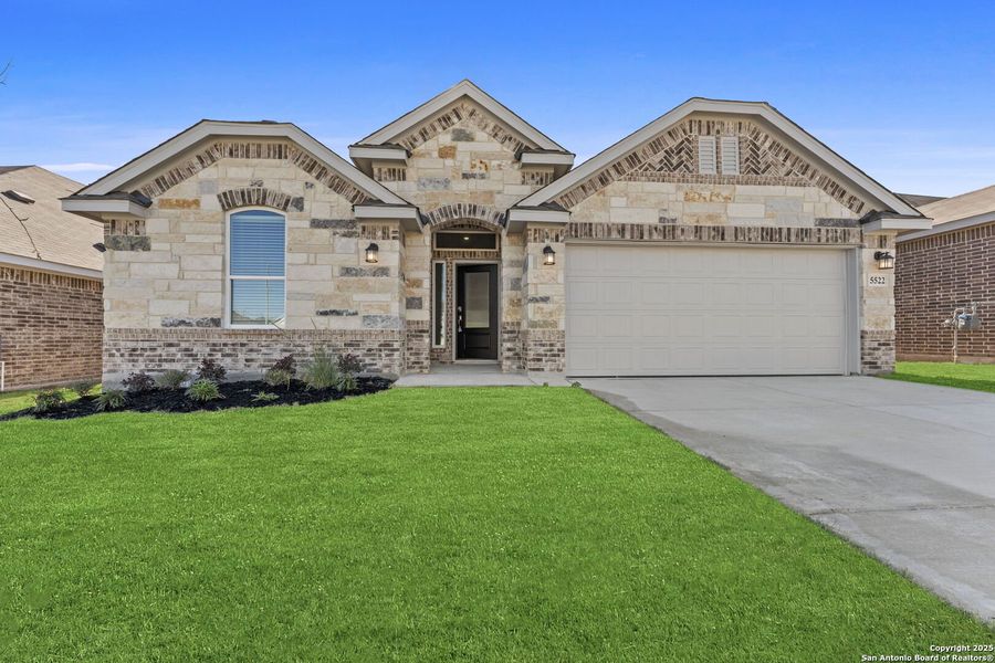 Front exterior of a new home in Gatehouse: Brookstone II Collection, New Braunfels, TX, highlighting curb appeal (Image 1).